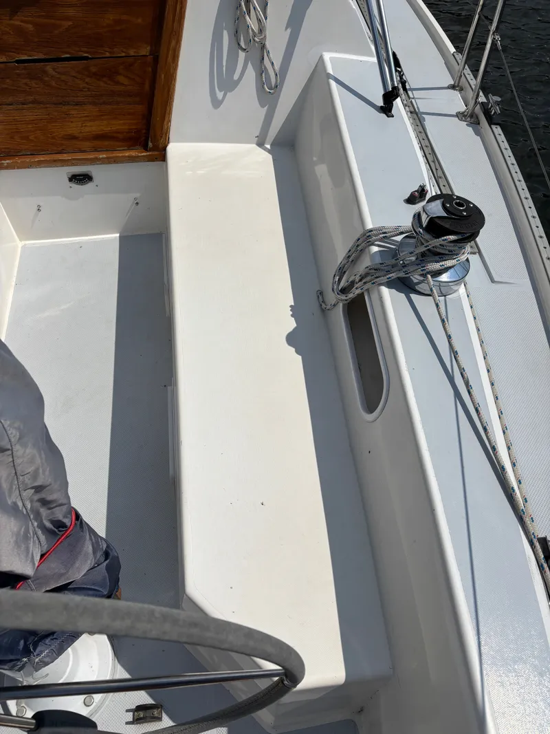 Slide: The Image of Cockpit of a 1992 Catalina 34 sailboat with winch and seating area. - 32