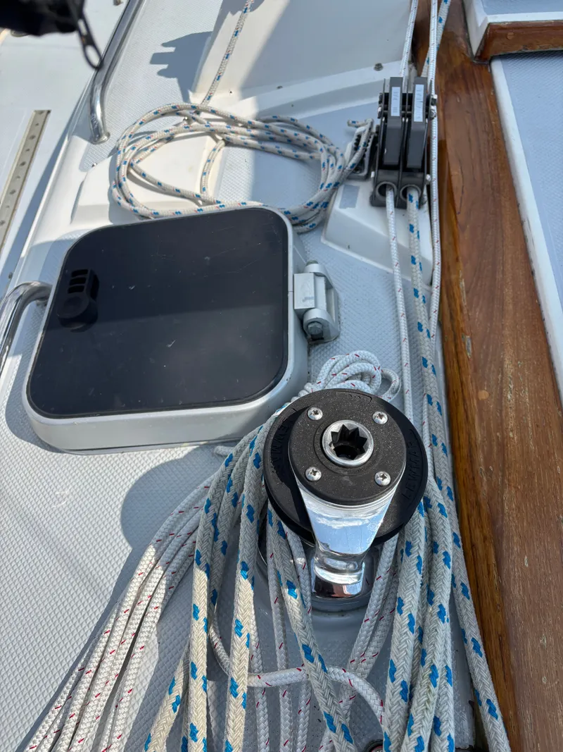 Slide: The Image of Sailboat deck with ropes and winch on a 1992 Catalina 34. - 40
