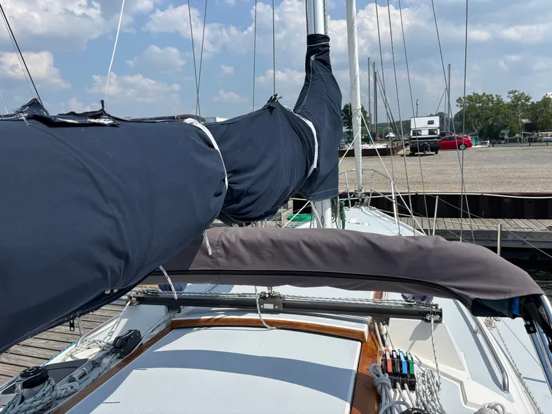 Slide: The Image of Sailboat deck view of a 1992 Catalina 34 at a marina. - 6
