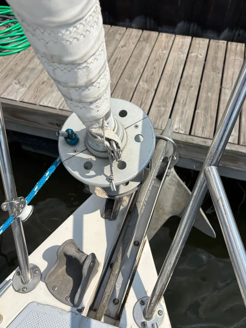 Slide: The Image of Close-up of a 1992 Catalina 34 sailboat's bow with anchor and rigging. - 9