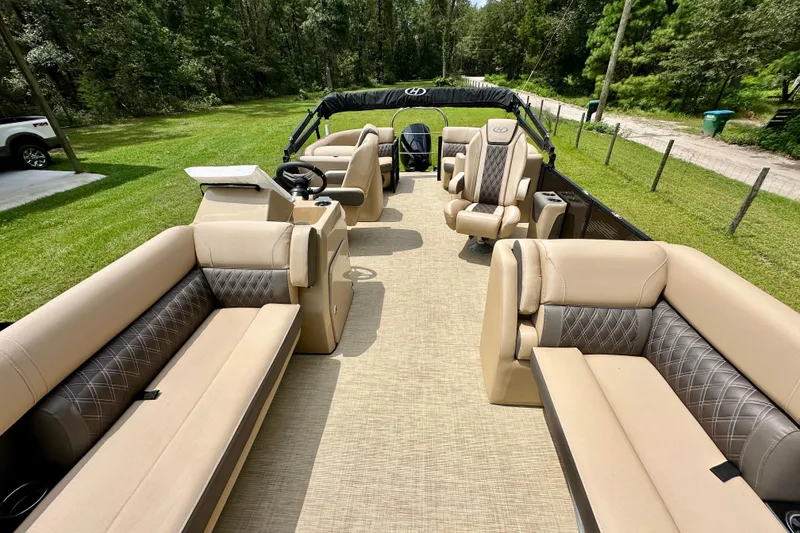 Slide: The Image of 2022 Harris FloteBote 230 Super Sunliner LX with luxurious seating and spacious deck. - 13