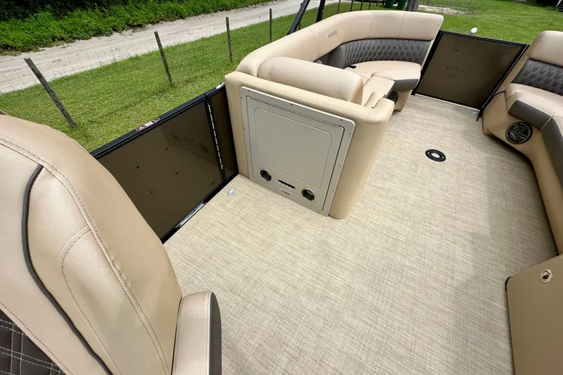 Slide: The Image of Interior of 2022 Harris FloteBote 230 Super Sunliner LX with beige seating and flooring. - 16