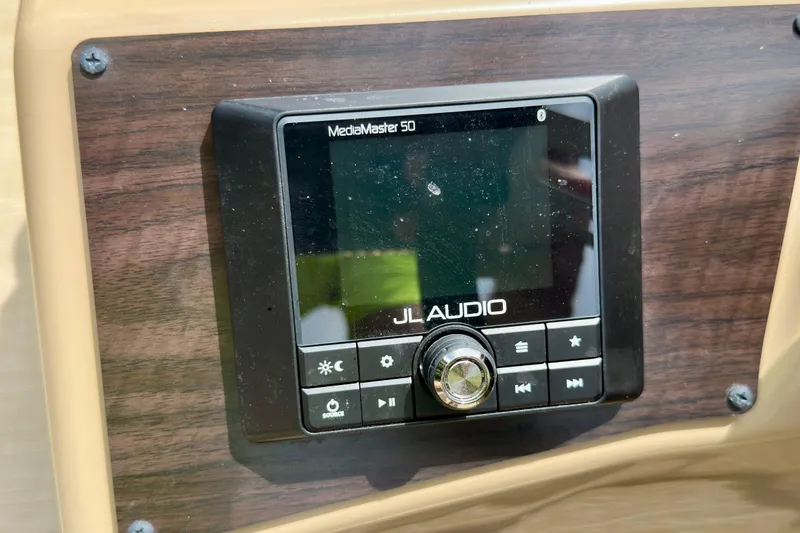 Slide: The Image of JL Audio MediaMaster 50 on 2022 Harris FloteBote 230 Super Sunliner LX dashboard. - 28