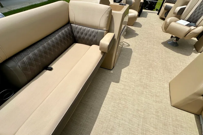 Slide: The Image of 2022 Harris FloteBote 230 Super Sunliner LX interior with beige seating and diamond stitching. - 29