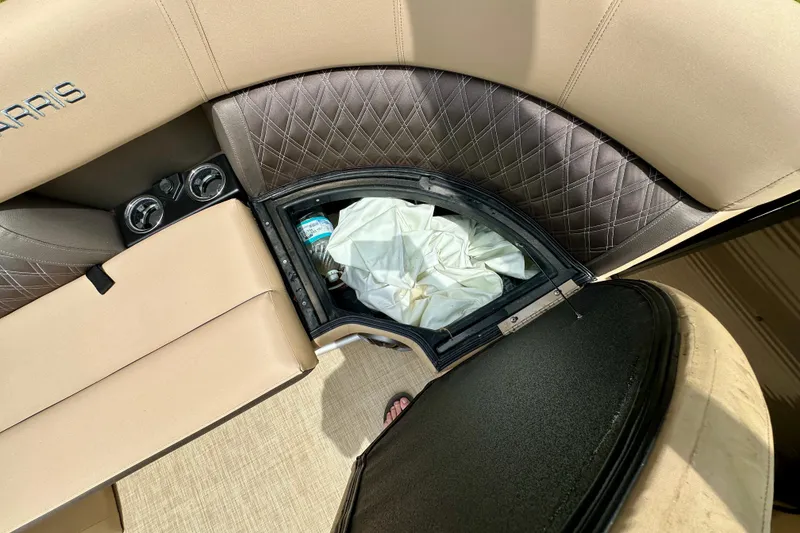 Slide: The Image of 2022 Harris FloteBote 230 Super Sunliner LX interior storage compartment with quilted upholstery. - 35