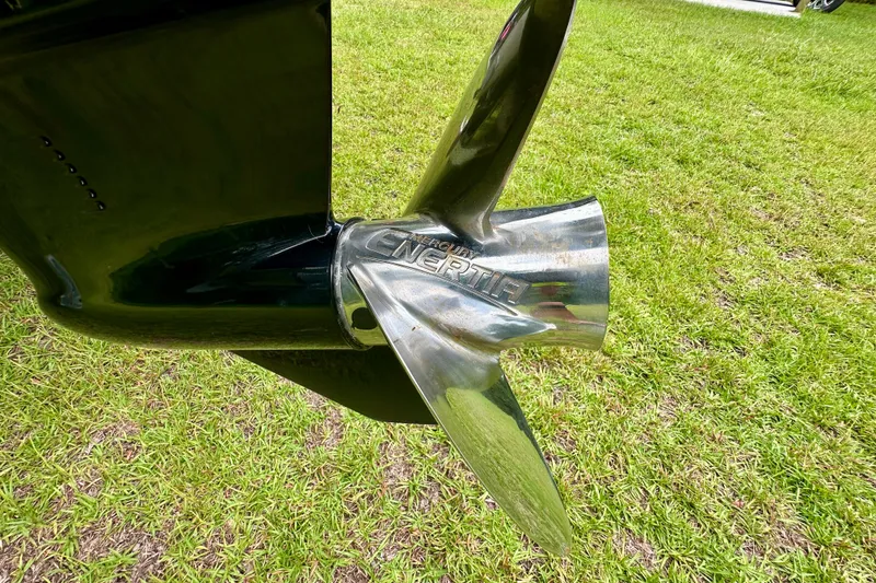 Slide: The Image of Close-up of a 2022 Harris FloteBote 230 Super Sunliner LX propeller on grass. - 46