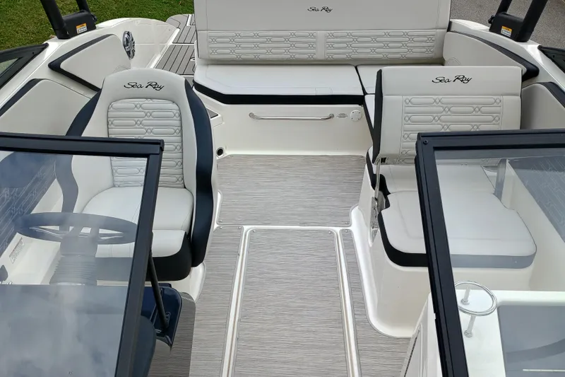 Slide: The Image of 2024 Sea Ray SPX 210 boat interior with stylish seating and modern design. - 5