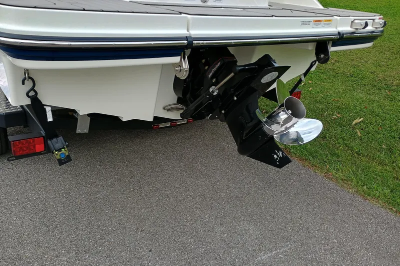 Slide: The Image of Rear view of 2024 Sea Ray SPX 210 boat with propeller and trailer. - 7