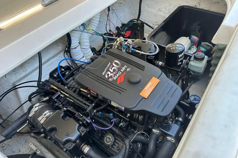 Slide: The Image of Engine compartment of 2002 Rinker 212 Captiva with MerCruiser 350 MPI engine. - 22