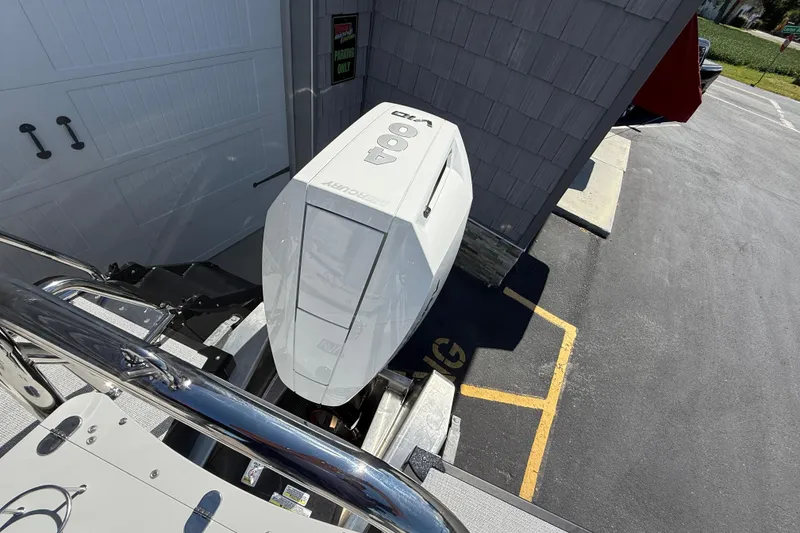 Slide: The Image of 2026 Avalon 2585 Excalibur LTD with Mercury 400hp V-10 Verado engine, parked outdoors. - 11