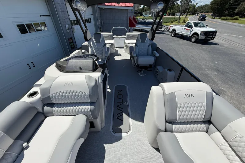 Slide: The Image of Luxurious 2026 Avalon 2585 Excalibur LTD boat interior with plush seating and modern design. - 17