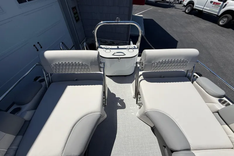 Slide: The Image of 2026 Avalon 2585 Excalibur LTD boat interior with quad lounger seating and modern design. - 24