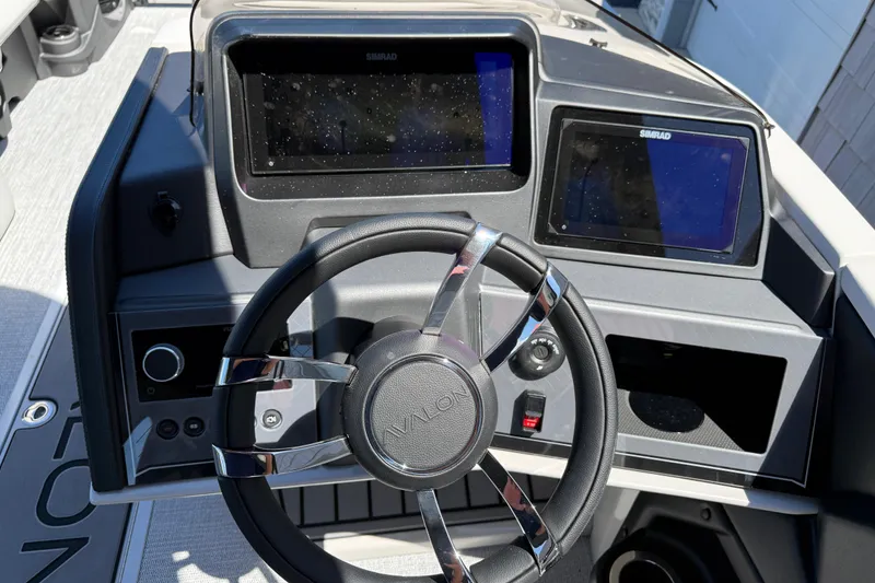 Slide: The Image of Steering console of 2026 Avalon 2585 Excalibur LTD with dual Simrad displays. - 28
