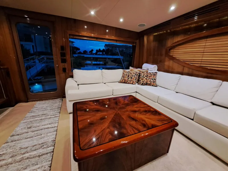 Slide: The Image of Luxurious interior of 2006 Hatteras 68 Convertible yacht with elegant furnishings. - 11