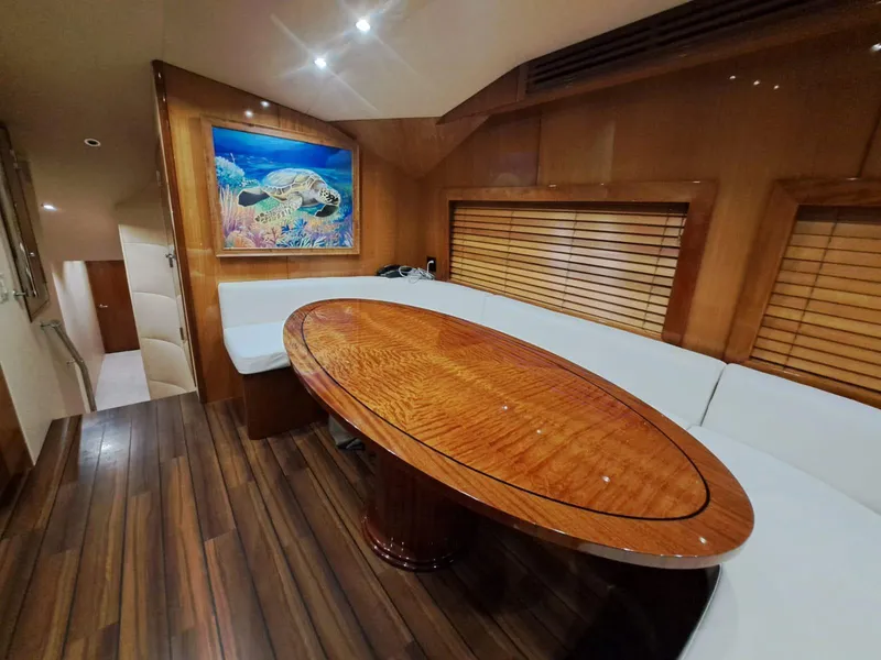 Slide: The Image of Luxurious kitchen interior of 2006 Hatteras 68 Convertible yacht with wood flooring and granite countertops. - 18