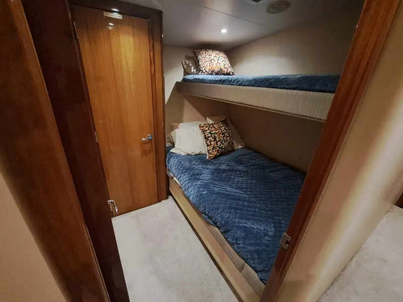 Slide: The Image of Luxurious bedroom interior of 2006 Hatteras 68 Convertible yacht. - 35