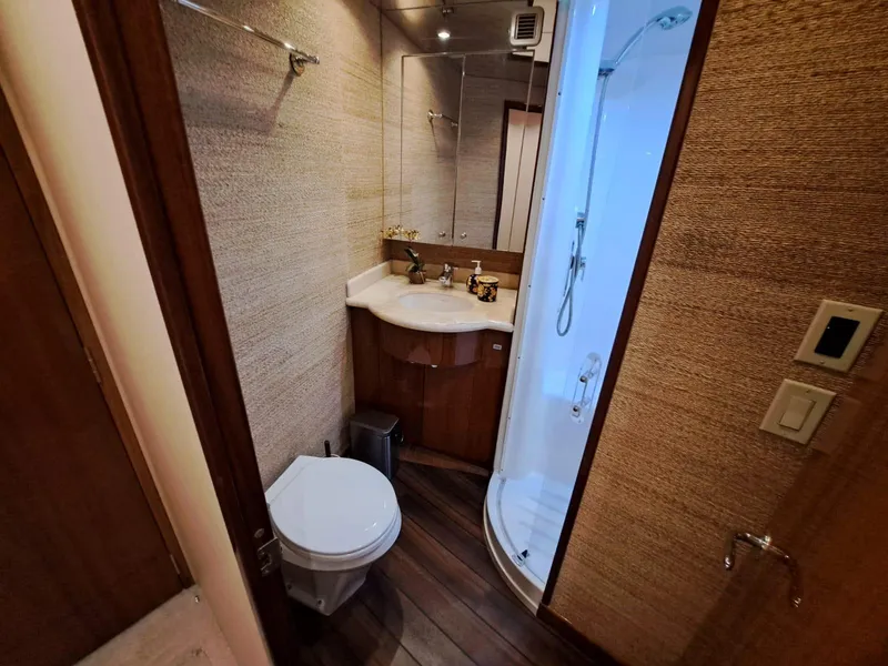 Slide: The Image of Bunk beds in 2006 Hatteras 68 Convertible yacht cabin with wooden door. - 36