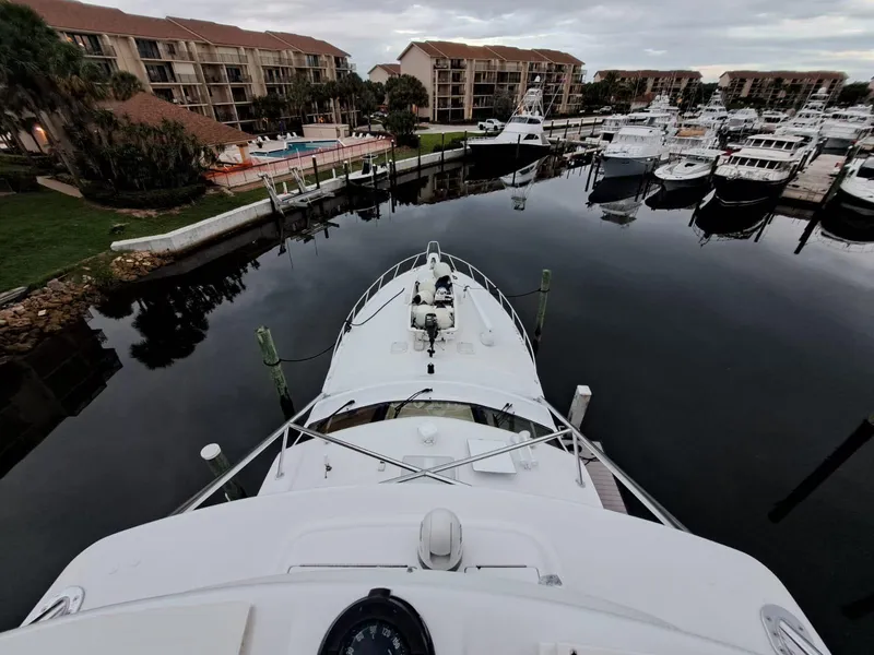 Slide: The Image of Aerial view of 2006 Hatteras 68 Convertible yacht docked at marina. - 41