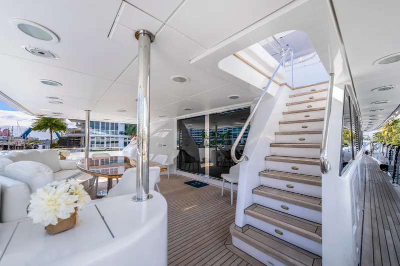 Slide: The Image of Luxurious 1998 Intermarine 118 yacht interior with elegant seating and staircase. - 17