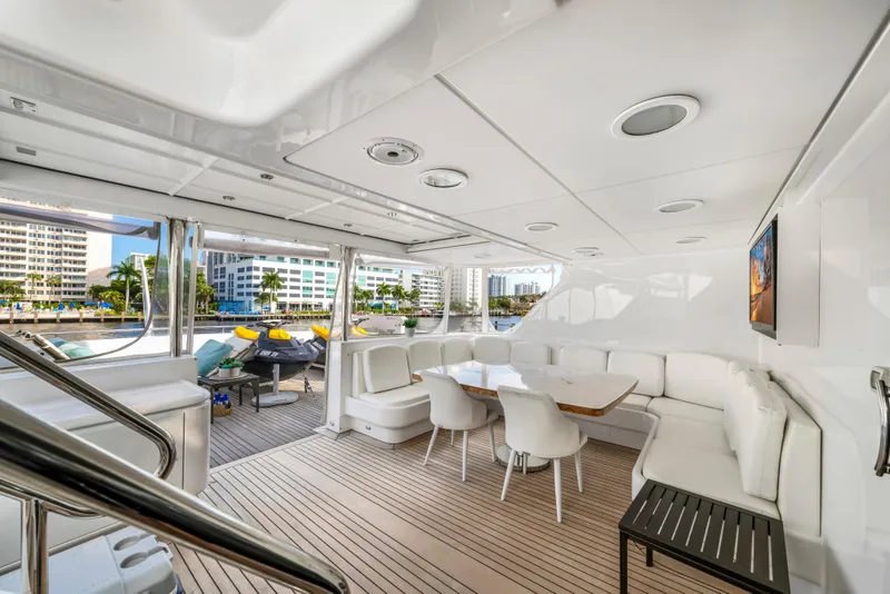 Slide: The Image of Luxurious 1998 Intermarine 118 yacht interior with elegant seating and waterfront view. - 18