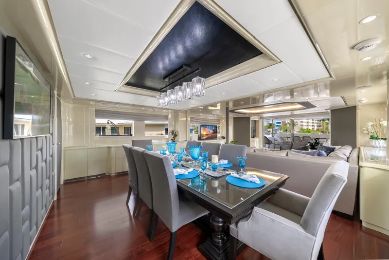 Slide: The Image of Luxurious dining area on 1998 Intermarine 118 yacht with elegant decor and modern furnishings. - 23