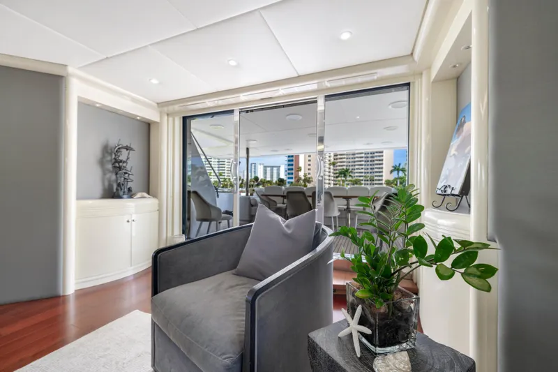 Slide: The Image of Luxurious 1998 Intermarine 118 yacht interior with modern decor and large windows. - 27