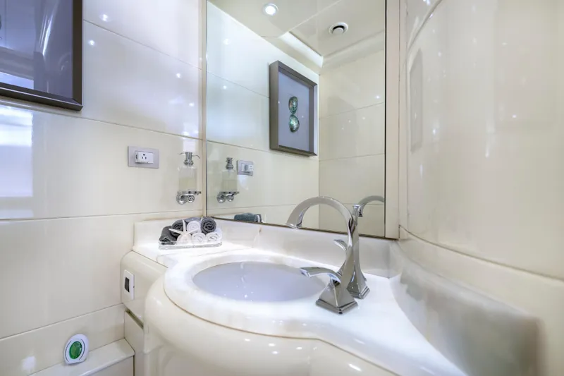 Slide: The Image of Luxurious bathroom in 1998 Intermarine 118 yacht with modern fixtures and elegant design. - 39