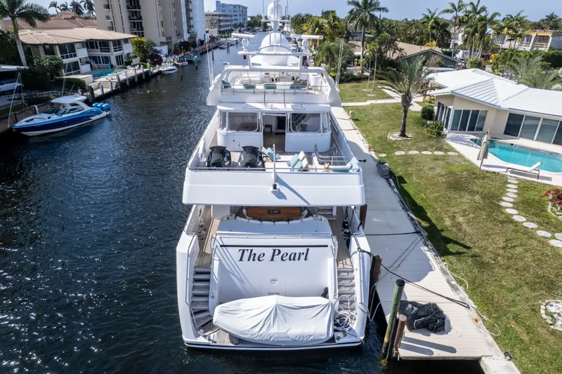 Slide: The Image of Luxury yacht "The Pearl" docked in a scenic canal, Intermarine 118, 1998 model. - 4