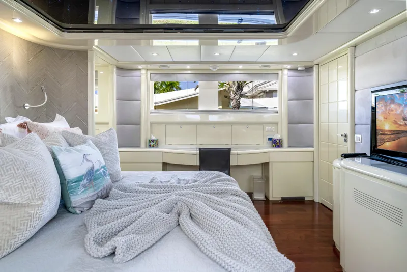 Slide: The Image of Luxurious bedroom interior of 1998 Intermarine 118 yacht with modern decor and cozy bedding. - 41