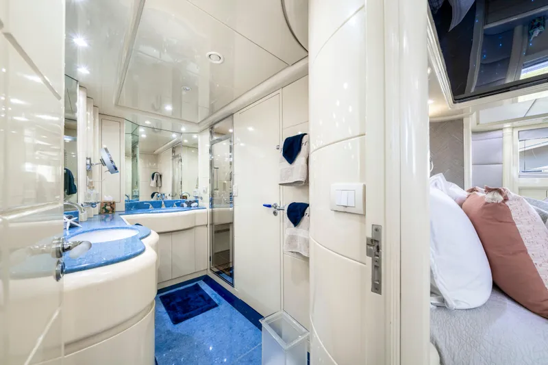 Slide: The Image of Luxurious bathroom interior on 1998 Intermarine 118 yacht, featuring elegant design and modern amenities. - 42