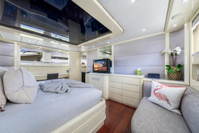 Slide: The Image of Luxurious 1998 Intermarine 118 yacht bedroom with modern decor and elegant furnishings. - 45