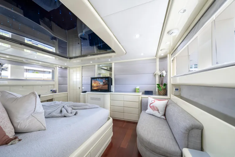 Slide: The Image of Luxurious bedroom interior of 1998 Intermarine 118 yacht with modern decor and elegant furnishings. - 46