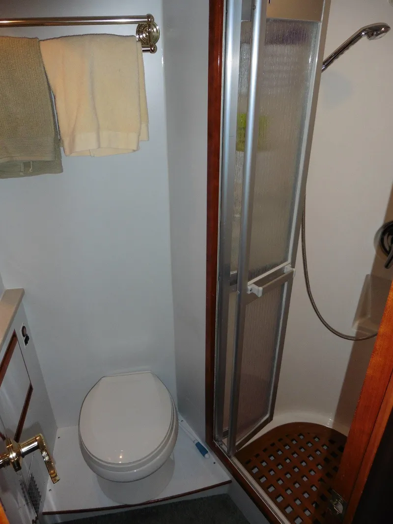 Slide: The Image of Bathroom in 2000 Novatec Cockpit Motor Yacht with shower and toilet. - 15