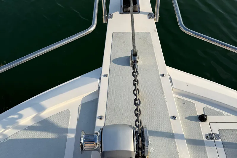 Slide: The Image of Bow of 2000 Novatec Cockpit Motor Yacht with anchor chain and railing. - 48