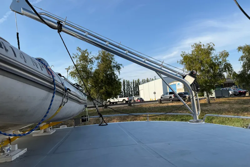 Slide: The Image of Novatec 2000 Cockpit Motor Yacht with crane and trees in background. - 49