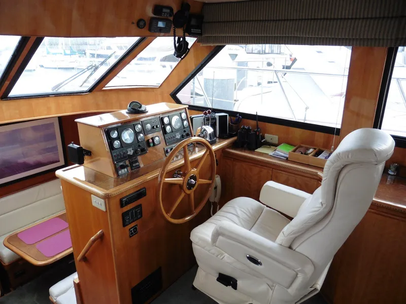 Slide: The Image of Cockpit of 2000 Novatec Motor Yacht with steering wheel and control panel. - 5