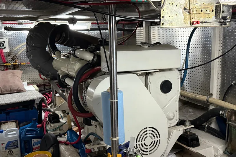 Slide: The Image of Engine room of a 2000 Novatec Cockpit Motor Yacht with visible machinery and equipment. - 59