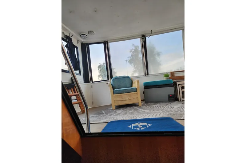 Slide: The Image of Interior of 2000 Novatec Cockpit Motor Yacht with seating and large windows. - 66