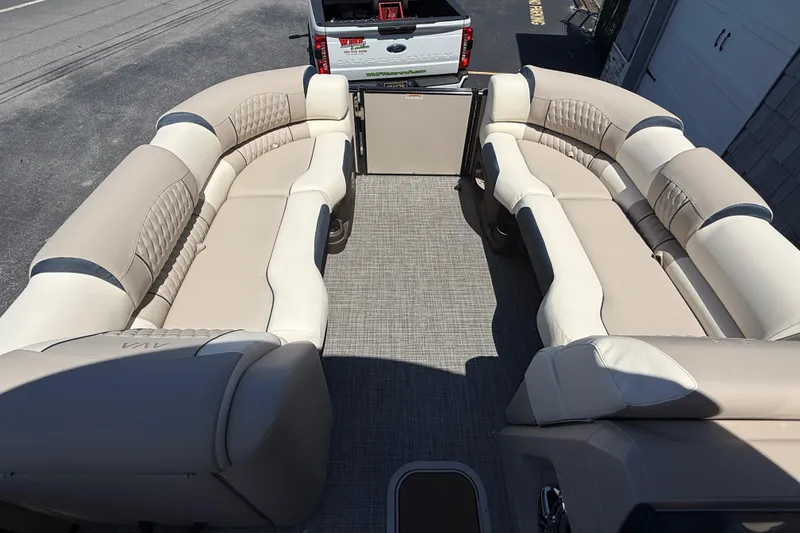 Slide: The Image of Luxurious interior of 2026 Avalon 2385 Catalina Quad Lounger, featuring plush seating and modern controls. - 18