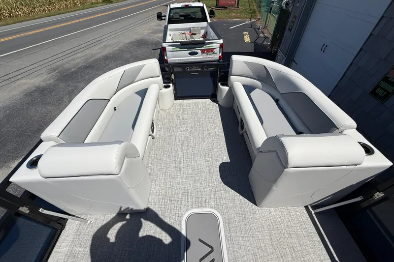Slide: The Image of 2025 Avalon 2385 Venture 85 Tri Toon boat with spacious seating and high-performance design. - 17