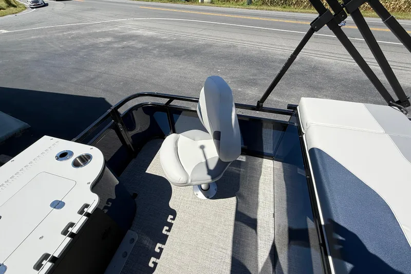Slide: The Image of 2025 Avalon 2385 Venture 85 Rear Fish boat interior with seating and fishing station. - 26