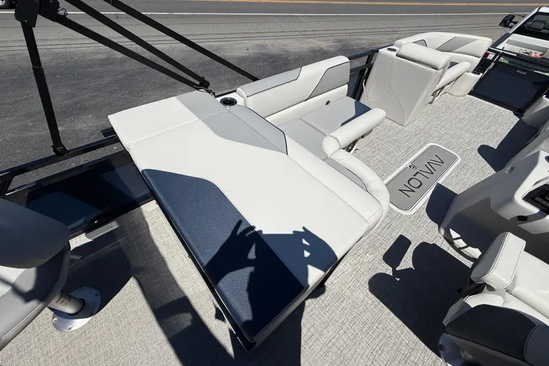 Slide: The Image of 2025 Avalon 2385 Venture 85 Rear Fish boat interior with plush seating and modern design. - 27