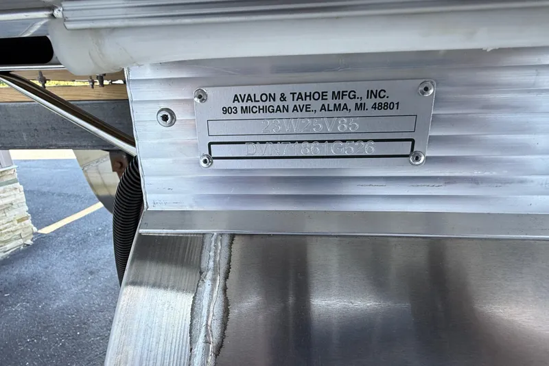 Slide: The Image of Metal identification plate on a 2025 Avalon 2385 Venture 85 Rear Fish Tri Toon boat. - 28