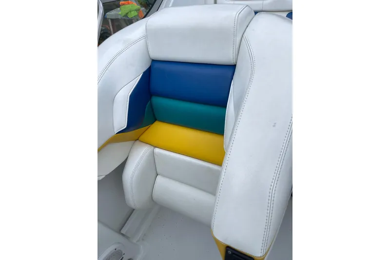 Slide: The Image of Colorful seat upholstery in a 1999 Formula 271 FASTech boat. - 25