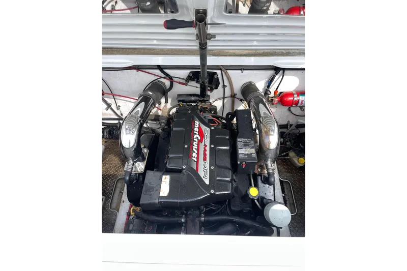 Slide: The Image of Engine compartment of a 1999 Formula 271 FASTech boat with MerCruiser engine. - 33