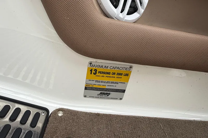 Slide: The Image of 2007 Cobalt 232 capacity plate, maximum 13 persons or 2000 lbs, compliance details. - 16