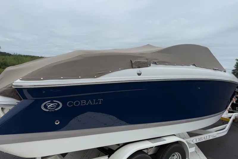 Slide: The Image of 2007 Cobalt 232 boat with cover on trailer, side view. - 21