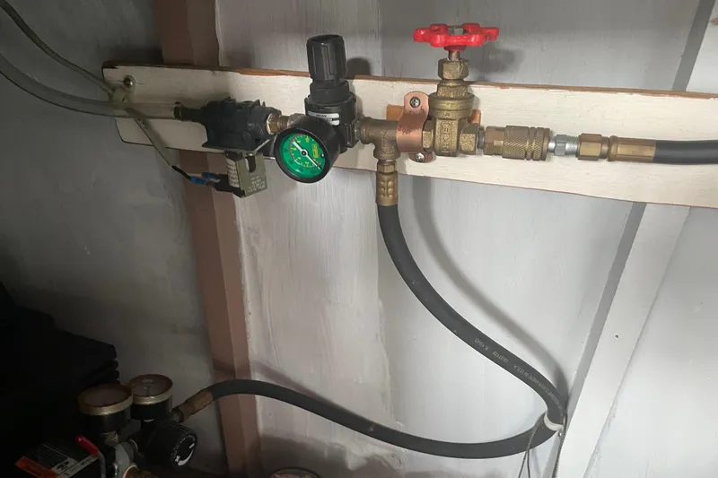 Slide: The Image of Engine room piping and gauges on a 1978 Delta Marine 43 Trawler. - 12