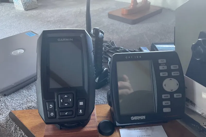 Slide: The Image of Garmin GPS devices on Delta Marine 43 Trawler, 1978 model, displayed indoors. - 27