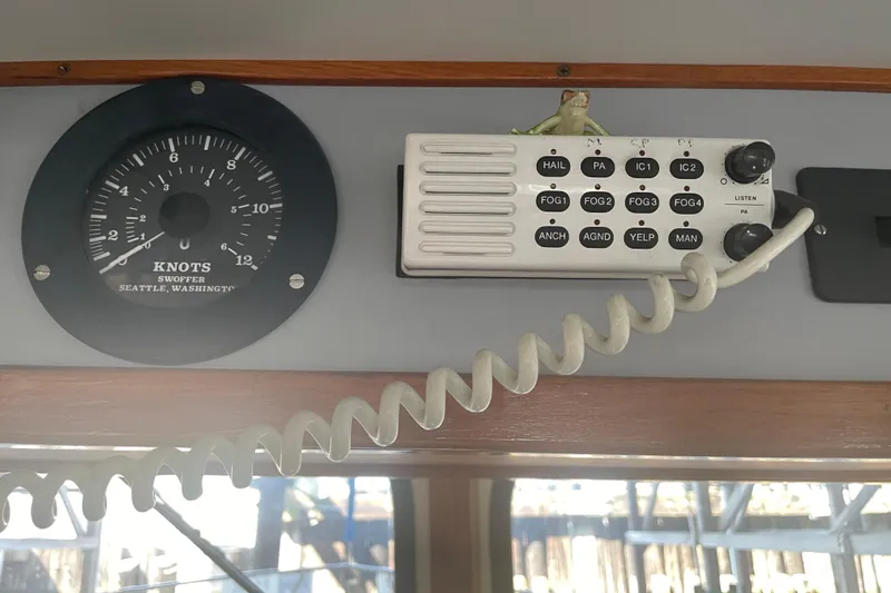 Slide: The Image of 1978 Delta Marine 43 Trawler dashboard with speedometer and communication panel. - 31